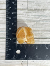 Load image into Gallery viewer, Orange Calcite Skull Carving