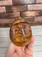 Load image into Gallery viewer, Golden Healer Skull Carving