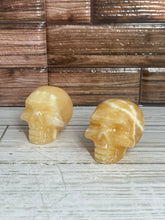 Load image into Gallery viewer, Orange Calcite Skull Carving