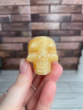 Load image into Gallery viewer, Orange Calcite Skull Carving